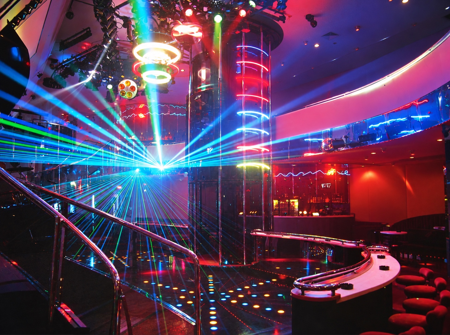 The Palladium nightclub in the 1980s, with colourful laser beams crossing the dance floor